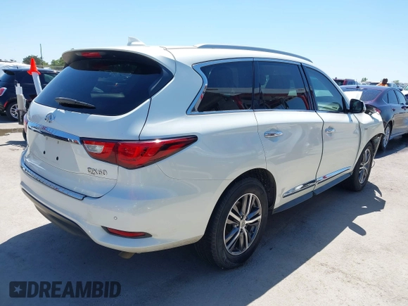 2016 Infiniti QX60 with VIN 5N1AL0MMXGC511972, listed as a IAAI auction lot 41979787 with 127,298 mi miles and . Bid and sale history available at DreamBid. Image 4.