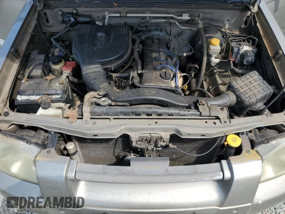 2003 Nissan Frontier XE with VIN 1N6DD26T43C452553, listed as a Copart auction lot 53139715 with 217,731 mi miles and Salvage title. Bid and sale history available at DreamBid. Image 11.