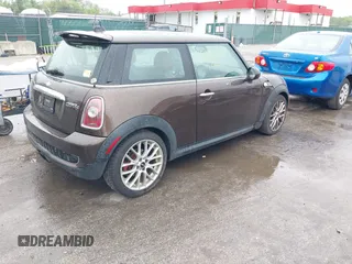 2010 MINI Hardtop S with VIN WMWMF7C50ATZ74395, listed as a IAAI auction lot 42227483 with 109,704 mi miles and . Bid and sale history available at DreamBid. Image 4.