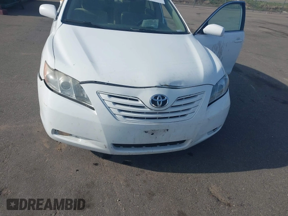 2007 Toyota Camry CE with VIN 4T1BE46KX7U517265, listed as a IAAI auction lot 42098343 with 131,541 mi miles. Bid and sale history available at carsss.com. Image 6.