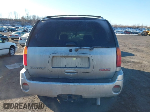 2005 GMC Envoy SLE with VIN 1GKDT13S452194933, listed as a IAAI auction lot 41426512 with 176,897 mi miles. Bid and sale history available at carsss.com. Image 16.