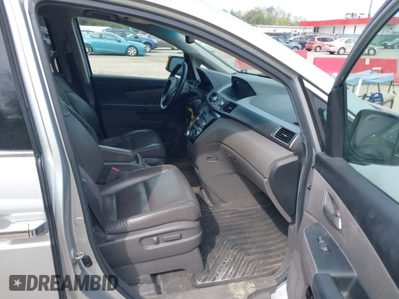 2012 Honda Odyssey Touring with VIN 5FNRL5H92CB055473, listed as a IAAI auction lot 42128601 with 163,901 mi miles. Bid and sale history available at carsss.com. Image 5.
