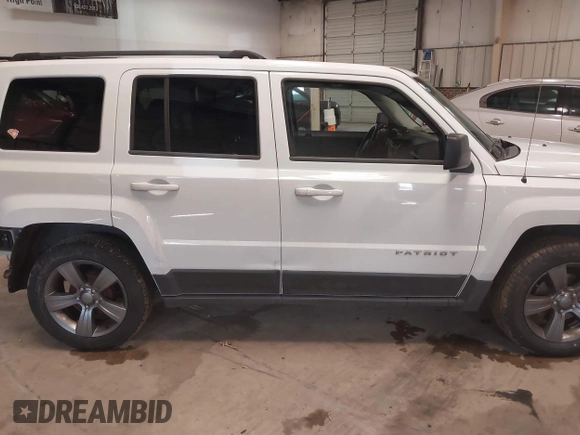 2014 Jeep Patriot Latitude with VIN 1C4NJPFA3ED739925, listed as a IAAI auction lot 41623546 with 130,374 mi miles and . Bid and sale history available at carsss.com. Image 13.