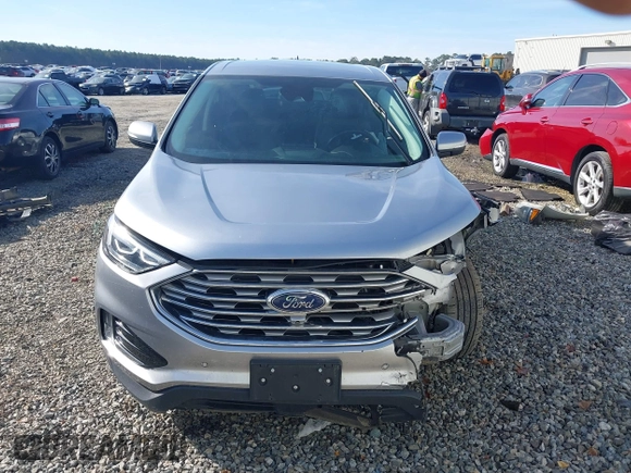 2022 Ford Edge Titanium z VIN 2FMPK4K95NBA38997, wystawiony jako IAAI lot #41467300 z przebiegiem 74 310 mil mil oraz . Historia ofert i sprzedaży dostępna na DreamBid. Obrazek 12.