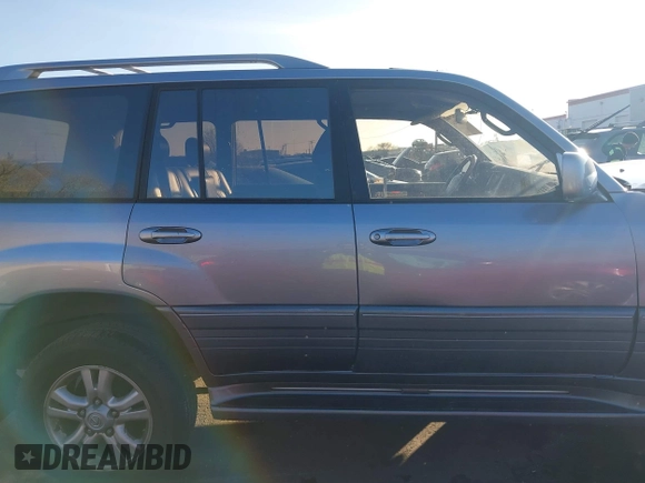 2003 Lexus LX with VIN JTJHT00W133534624, listed as a IAAI auction lot 40993924 with 161,022 mi miles. Bid and sale history available at carsss.com. Image 13.