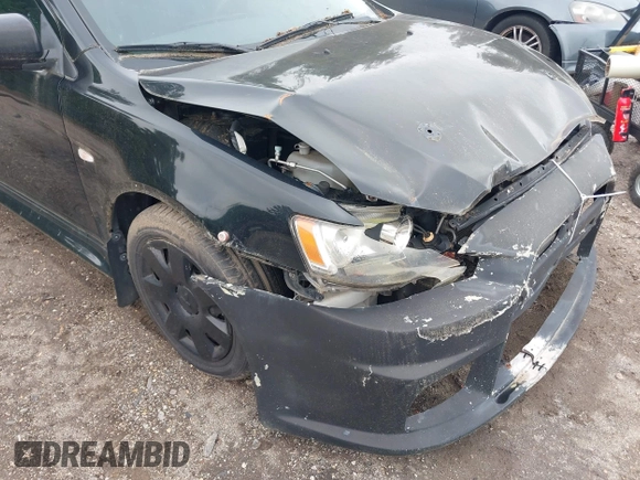 2011 Mitsubishi Lancer ES z VIN JA32U2FU0BU043024, wystawiony jako IAAI lot #42367152 z przebiegiem 167 655 mil mil oraz . Historia ofert i sprzedaży dostępna na DreamBid. Obrazek 14.