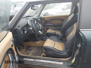2006 MINI Hardtop with VIN WMWRC33506TK73564, listed as a IAAI auction lot 42602486 with 156,459 mi miles and . Bid and sale history available at DreamBid. Image 5.