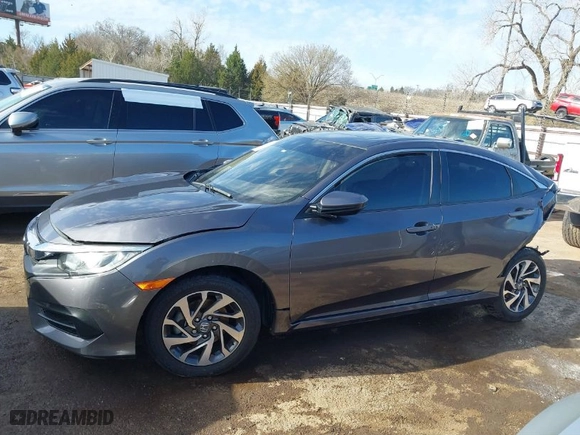 2018 Honda Civic Sedan EX with VIN 2HGFC2F70JH551285, listed as a IAAI auction lot 41770547 with 147,521 mi miles. Bid and sale history available at carsss.com. Image 14.