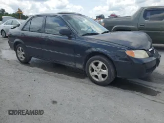 2002 Mazda Protege DX z VIN JM1BJ225020537013, wystawiony jako Copart lot #56952495 z przebiegiem 129 846 mil mil oraz Czysty tytuł • Clean title. Historia ofert i sprzedaży dostępna na DreamBid. Obrazek 4.