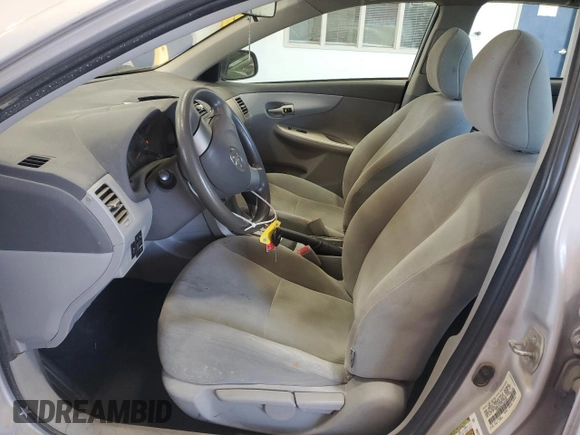 2010 Toyota Corolla with VIN 1NXBU4EE1AZ357430, listed as a Copart auction lot 64654795 with 179,113 mi miles and Salvage title. Bid and sale history available at DreamBid. Image 7.