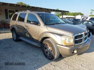 2005 Dodge Durango z VIN 1D4HD48K25F545306, wystawiony jako IAAI lot #42006462 z przebiegiem 241 988 mil mil oraz . Historia ofert i sprzedaży dostępna na DreamBid. Obrazek 1.