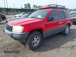 2001 Jeep Grand Cherokee Laredo with VIN 1J4GX48SX1C522670, listed as a IAAI auction lot 42111708 with Not provided miles and . Bid and sale history available at DreamBid. Image 2.