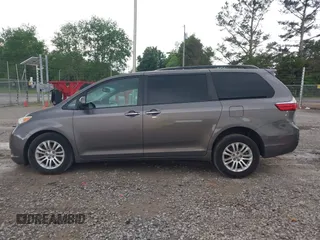 2016 Toyota Sienna XLE with VIN 5TDYK3DC8GS721290, listed as a IAAI auction lot 42127035 with 142,150 mi miles and . Bid and sale history available at DreamBid. Image 14.