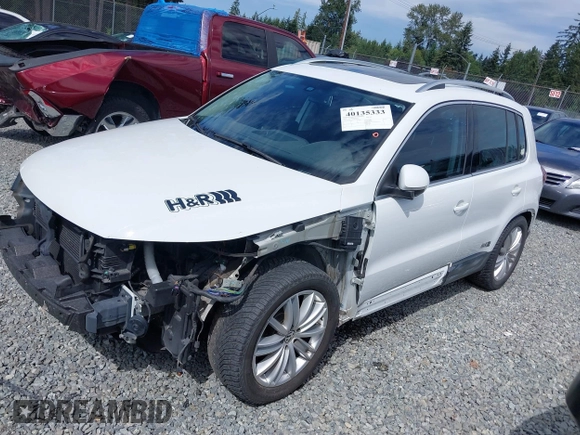 2016 Volkswagen Tiguan S with VIN WVGBV7AXXGW580052, listed as a IAAI auction lot 41444015 with 102,165 mi miles and . Bid and sale history available at DreamBid. Image 2.