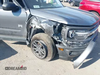 2023 Ford Bronco Sport Big Bend z VIN 3FMCR9B62PRE09504, wystawiony jako IAAI lot #41780893 z przebiegiem 23 140 mil mil oraz . Historia ofert i sprzedaży dostępna na DreamBid. Obrazek 6.