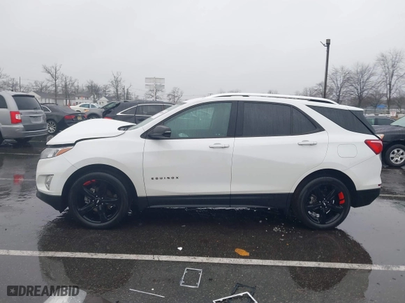 2021 Chevrolet Equinox Premier with VIN 2GNAXNEV7M6112087, listed as a IAAI auction lot 41102702 with 32,995 mi miles. Bid and sale history available at carsss.com. Image 14.