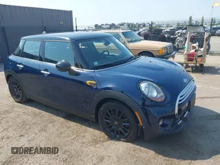 2015 MINI Hardtop 4 Door with VIN WMWXS5C50FT830060, listed as a IAAI auction lot 42744826 with 99,813 mi miles and . Bid and sale history available at DreamBid. Image 1.