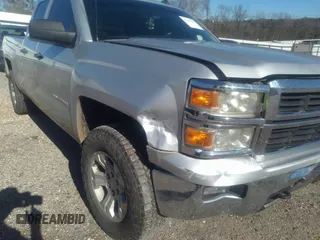 2014 Chevrolet Silverado 1500 LT with VIN 1GCVKREC7EZ120159, listed as a IAAI auction lot 41191282 with 206,836 mi miles and . Bid and sale history available at DreamBid. Image 21.