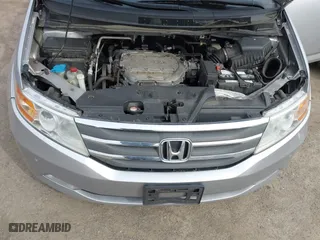 2013 Honda Odyssey Touring with VIN 5FNRL5H97DB021403, listed as a IAAI auction lot 41606606 with 223,547 mi miles. Bid and sale history available at carsss.com. Image 10.