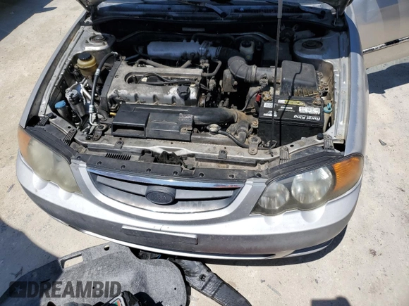 2004 Kia Spectra GS with VIN KNAFB161945141309, listed as a Copart auction lot 52395445 with 99,100 mi miles and Clean Title. Bid and sale history available at DreamBid. Image 11.