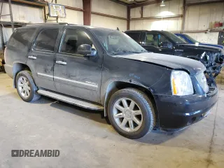 2011 GMC Yukon Denali with VIN 1GKS2EEF6BR321895, listed as a Copart auction lot 88364515 with 99,115 mi miles and Salvage Title. Bid and sale history available at DreamBid. Image 4.