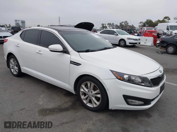 2013 Kia Optima EX z VIN 5XXGN4A75DG099762, wystawiony jako IAAI lot #42443408 z przebiegiem 110 189 mil mil oraz . Historia ofert i sprzedaży dostępna na DreamBid. Obrazek 1.