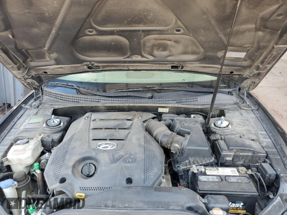 2009 Hyundai Azera Limited с VIN KMHFC46F49A388051, выставлен на аукционе Copart как лот 56252425 с пробегом 177 171 миль миль и Списание • Salvage title. История ставок и продаж доступна на DreamBid. Изображение 11.