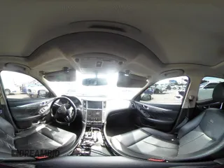 2014 Infiniti Q50 Premium z VIN JN1BV7AP9EM684709, wystawiony jako IAAI lot #41901877 z przebiegiem 91 425 mil mil oraz . Historia ofert i sprzedaży dostępna na DreamBid. Obrazek 19.