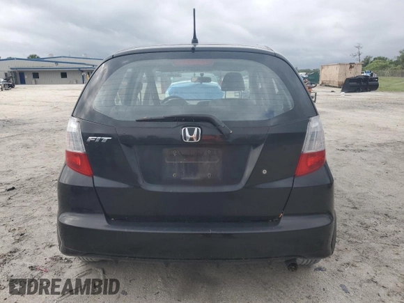 2009 Honda Fit with VIN JHMGE88249S068080, listed as a Copart auction lot 52469735 with 222,156 mi miles and Clean Title. Bid and sale history available at carsss.com. Image 6.