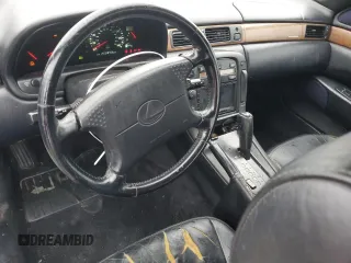 1995 Lexus SC 400 z VIN JT8UZ30CXS0039926, wystawiony jako Copart lot #89373825 z przebiegiem 252 843 mil mil oraz Szkody całkowita. Historia ofert i sprzedaży dostępna na DreamBid. Obrazek 8.