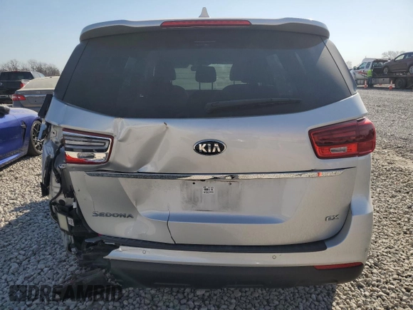 2021 Kia Sedona LX with VIN KNDMB5C17M6664764, listed as a Copart auction lot 48717575 with 70,099 mi miles and Salvage Title. Bid and sale history available at carsss.com. Image 6.