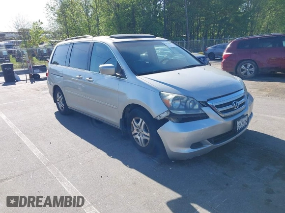 2006 Honda Odyssey EX-L with VIN 5FNRL38736B016026, listed as a IAAI auction lot 41971496 with 302,046 mi miles. Bid and sale history available at carsss.com. Image 1.