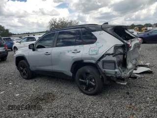 2021 Toyota RAV4 Hybrid XSE with VIN 2T3E6RFVXMW020561, listed as a Copart auction lot 64822005 with 39,434 mi miles and Salvage title. Bid and sale history available at DreamBid. Image 2.