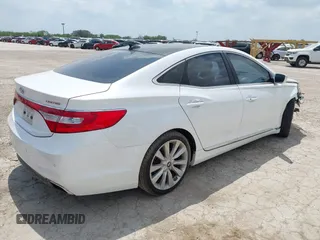 2015 Hyundai Azera Limited with VIN KMHFH4JG1FA476455, listed as a IAAI auction lot 42407261 with 110,293 mi miles and . Bid and sale history available at DreamBid. Image 4.