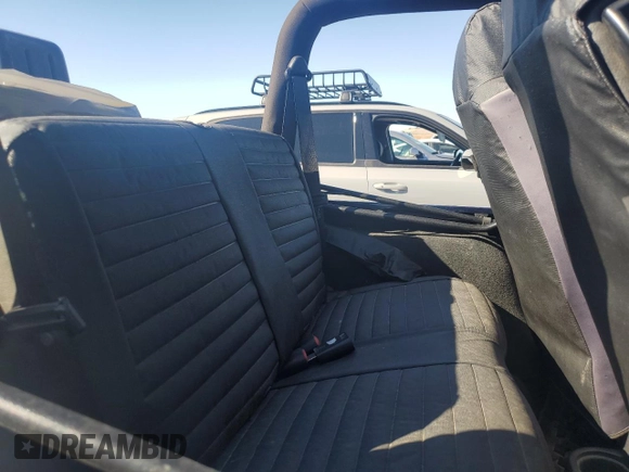 2005 Jeep Wrangler SE with VIN 1J4FA29S65P330905, listed as a Copart auction lot 71633134 with 77,598 mi miles and Salvage Title. Bid and sale history available at carsss.com. Image 10.