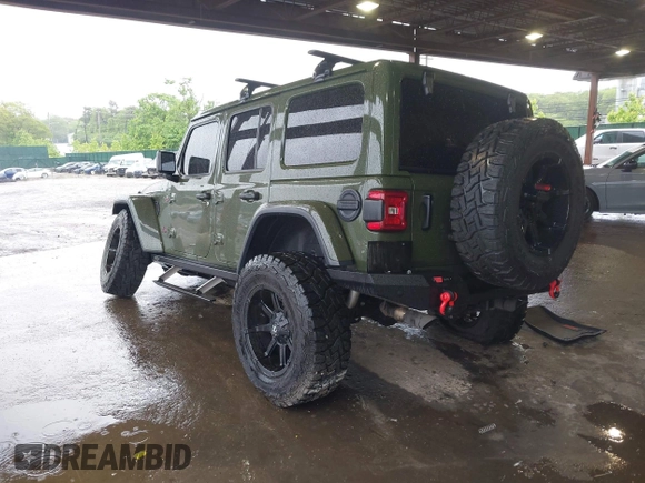 2021 Jeep Wrangler Unlimited Rubicon with VIN 1C4HJXFG4MW543254, listed as a IAAI auction lot 42316180 with 50,696 mi miles and . Bid and sale history available at DreamBid. Image 3.