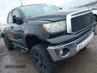 2012 Toyota Tundra 4WD Truck with VIN 5TFUW5F11CX220045, listed as a IAAI auction lot 41644218 with 182,559 mi miles. Bid and sale history available at carsss.com. Image 1.