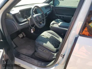 2023 Rivian R1S Launch Edition with VIN 7PDSGABLXPN004161, listed as a Copart auction lot 67390954 with 0 mi miles and Salvage Title. Bid and sale history available at carsss.com. Image 7.