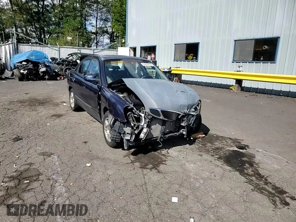 2001 Daewoo Nubira CDX z VIN KLAJB52Z31K647237, wystawiony jako Copart lot #69299834 z przebiegiem 51 513 mil mil oraz Szkody całkowita. Historia ofert i sprzedaży dostępna na DreamBid. Obrazek 11.