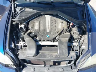 2012 BMW X5 50i with VIN 5UXZV8C57CL423223, listed as a IAAI auction lot 42606594 with 94,695 mi miles and . Bid and sale history available at DreamBid. Image 10.