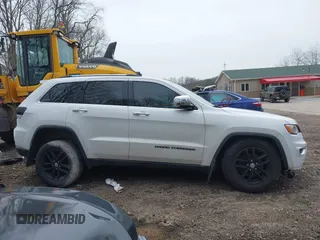 2018 Jeep Grand Cherokee Limited with VIN 1C4RJFBG0JC144620, listed as a IAAI auction lot 42018572 with 124,874 mi miles and . Bid and sale history available at DreamBid. Image 14.
