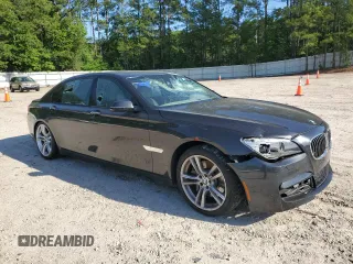2013 BMW 7 Series 750Li xDrive with VIN WBAYF8C57DD140694, listed as a Copart auction lot 56983435 with 113,444 mi miles and Salvage title. Bid and sale history available at DreamBid. Image 4.