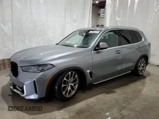 2024 BMW X5 sDrive40i z VIN 5UX13EU00R9U94158, wystawiony jako Copart lot #55799865 z przebiegiem 37 807 mil mil oraz Czysty tytuł • Clean title. Historia ofert i sprzedaży dostępna na DreamBid. Obrazek 1.