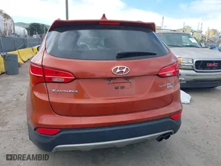 2013 Hyundai Santa Fe 2.0T Sport with VIN 5XYZUDLA3DG123041, listed as a IAAI auction lot 42004611 with 141,484 mi miles. Bid and sale history available at carsss.com. Image 16.