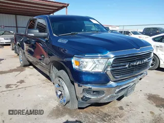 2021 Ram 1500 Lone Star z VIN 1C6SRFFT2MN634705, wystawiony jako IAAI lot #41766574 z przebiegiem 111 458 mil mil oraz . Historia ofert i sprzedaży dostępna na DreamBid. Obrazek 1.