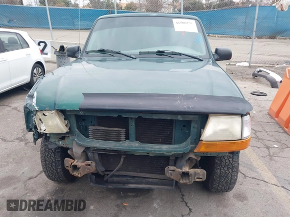 1999 Ford Ranger XLT with VIN 1FTYR14X2XPB07901, listed as a IAAI auction lot 41509235 with 115,418 mi miles. Bid and sale history available at carsss.com. Image 13.