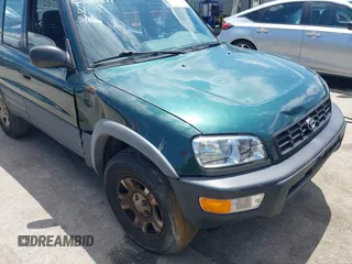 1998 Toyota RAV4 with VIN JT3GP10V6W0023680, listed as a IAAI auction lot 42235877 with 244,446 mi miles and . Bid and sale history available at DreamBid. Image 16.