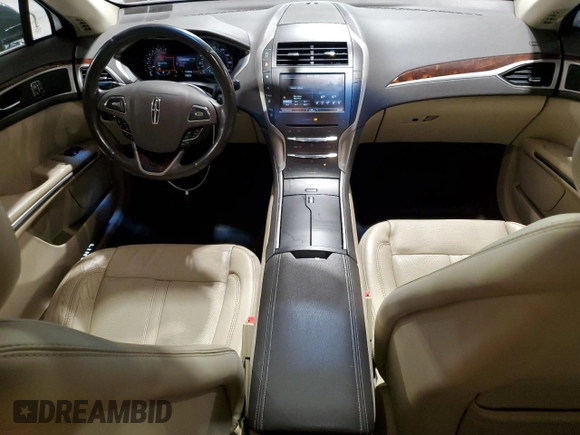 2015 Lincoln MKZ z VIN 3LN6L2J95FR613519, wystawiony jako Copart lot #59165895 z przebiegiem 117 630 mil mil oraz Szkoda całkowita • Salvage title. Historia ofert i sprzedaży dostępna na DreamBid. Obrazek 8.