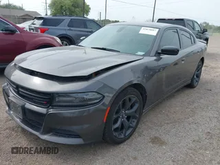 2020 Dodge Charger SXT z VIN 2C3CDXBG0LH238715, wystawiony jako IAAI lot #42078887 z przebiegiem 116 418 mil mil oraz . Historia ofert i sprzedaży dostępna na DreamBid. Obrazek 2.