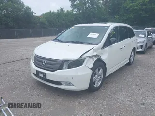 2013 Honda Odyssey Touring with VIN 5FNRL5H9XDB049390, listed as a IAAI auction lot 42532861 with 129,376 mi miles and . Bid and sale history available at DreamBid. Image 19.
